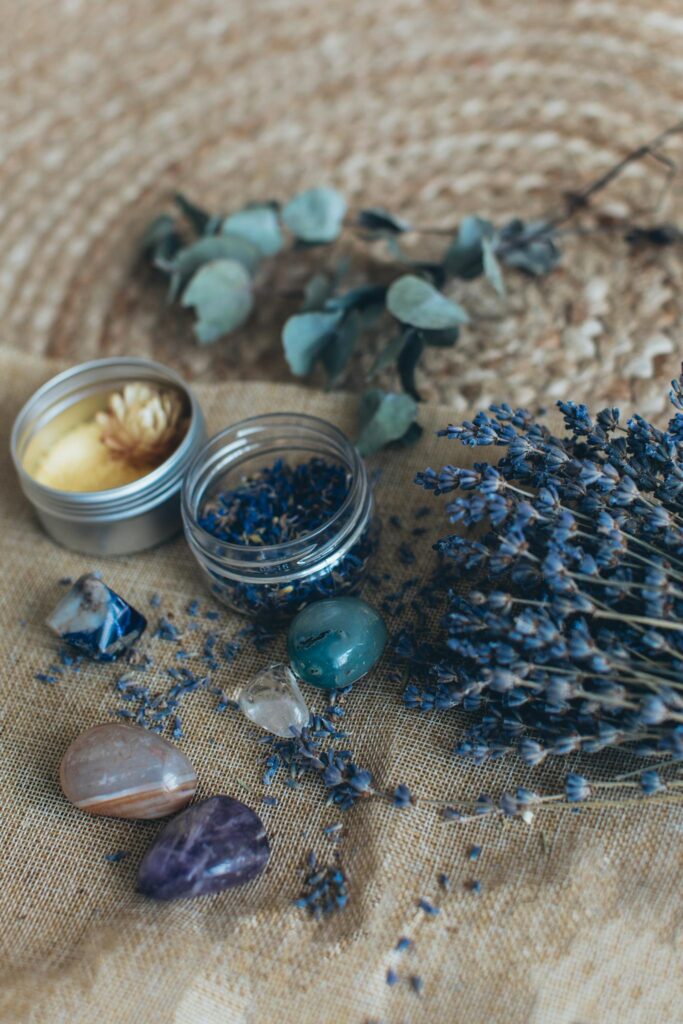 Styled arrangement featuring lavender, gemstones, and eucalyptus for a calming ambiance.